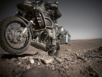 Motorcycle driving along a dirt path